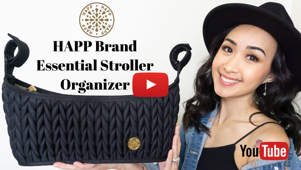 Screenshot of YouTube review of the HAPP Stroller Organizer in Blackby a mom influencer