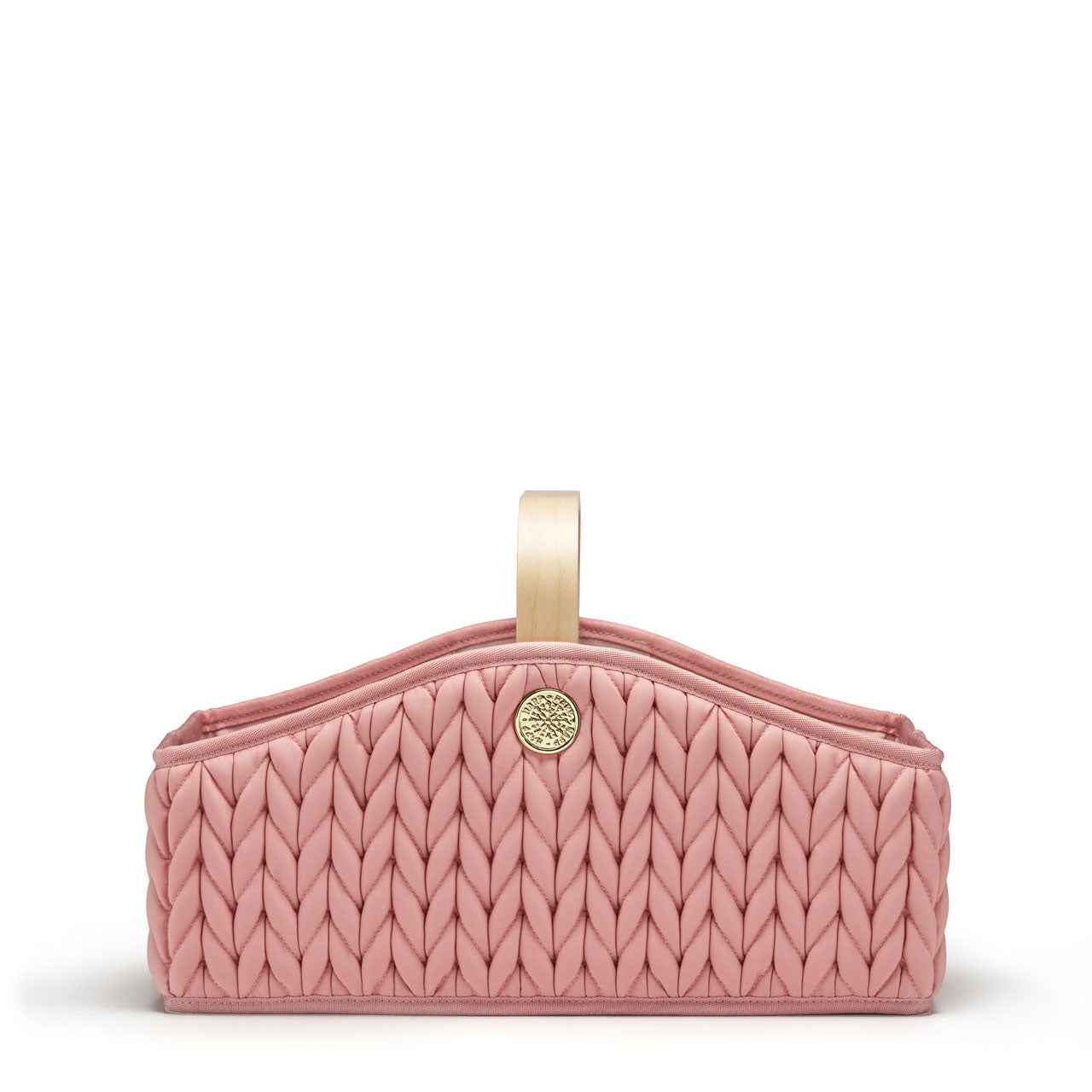 Rose diaper caddy with wooden handle, sleek curved sides, 3D quilted herringbone texture, and gold hardware details, shown straight on from the side.