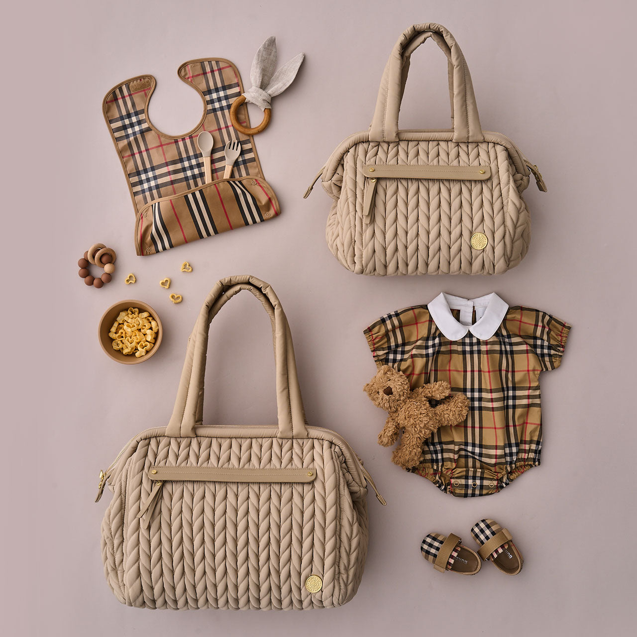 Size comparison of Paige Carryall Beige and Paige Mini Beige. Mini is about half the size.