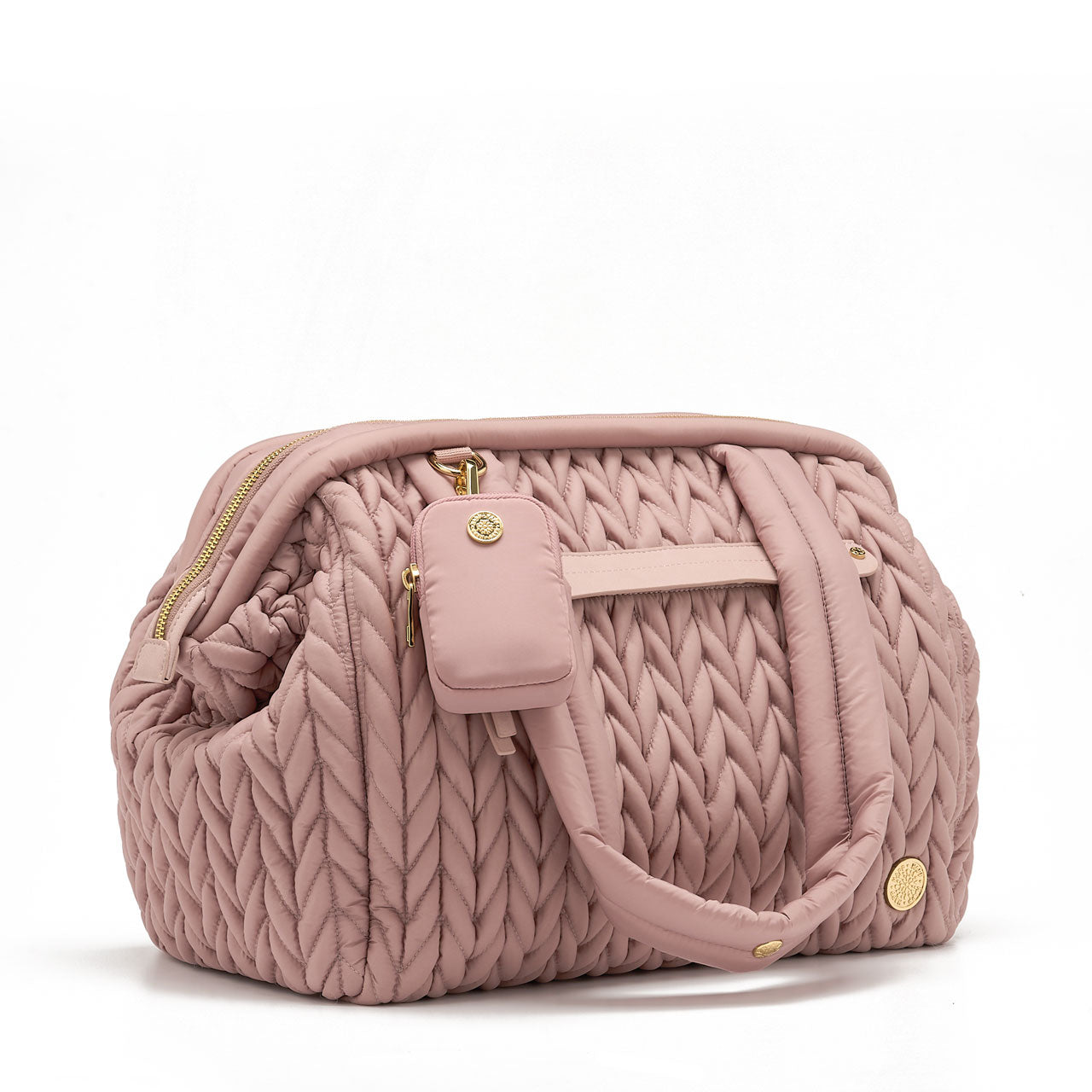 Clip-on Pouch Rose shown attached to the front D-ring of the Paige Carryall Rose; both items have matching gold hardware.