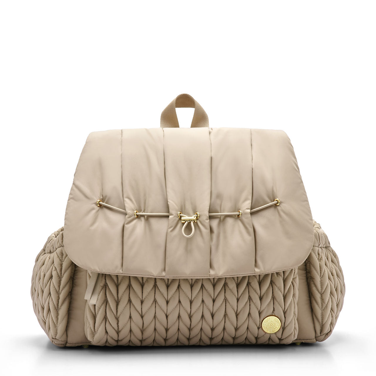A beige Levy backpack with a wide zippered flap and wide straps, featuring a quilted pattern on the front compartment and a gold logo emblem.