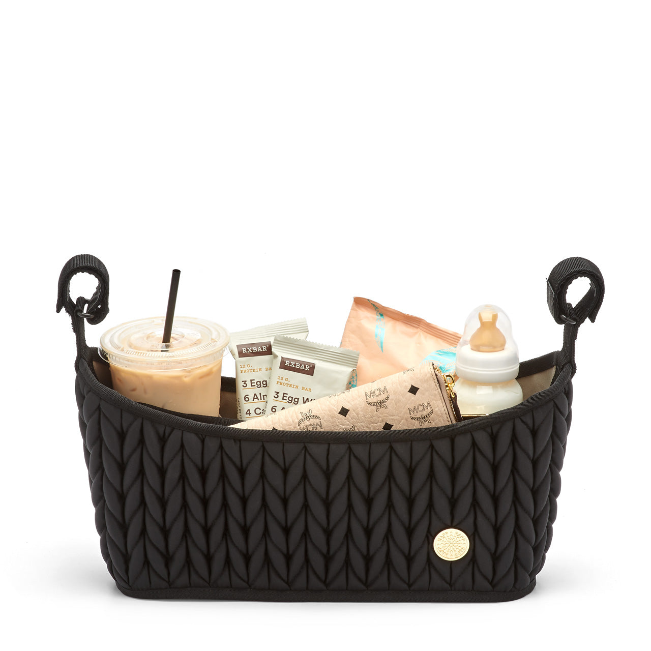 Fully packed Black stroller organizer standing upright on a white background. Shows herringbone quilting detail, gold hardware, and adjustable grippy straps.
