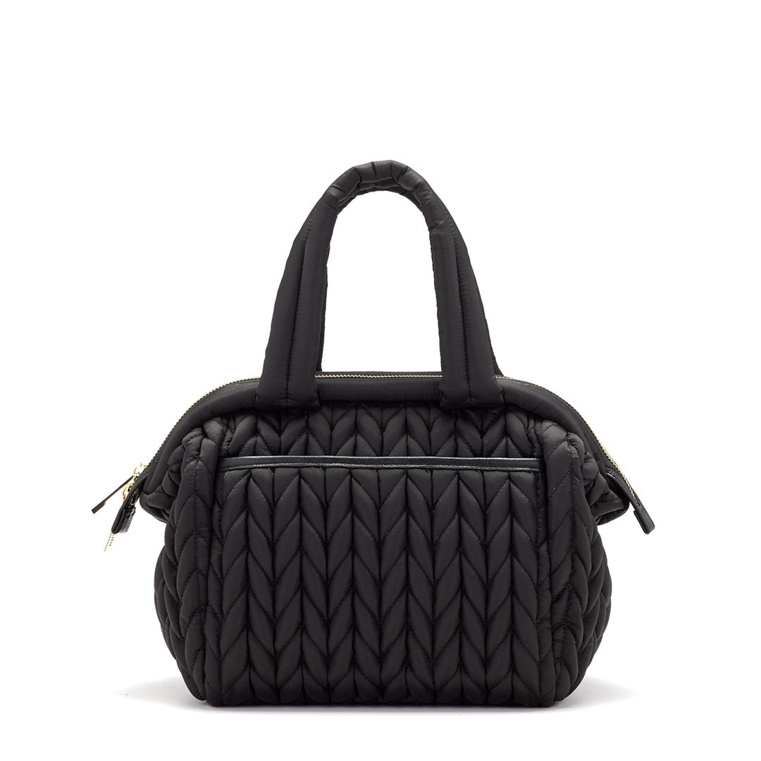 Back view of Paige Mini Black, showing the carry handles and back pocket with magnet closure.