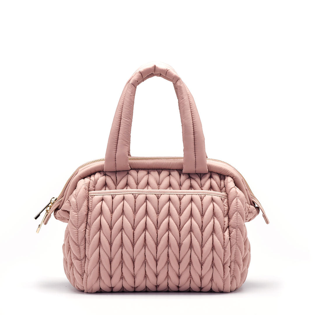 Back view of the Paige Mini Dusty Rose, showing the back pocket with magnet closure.