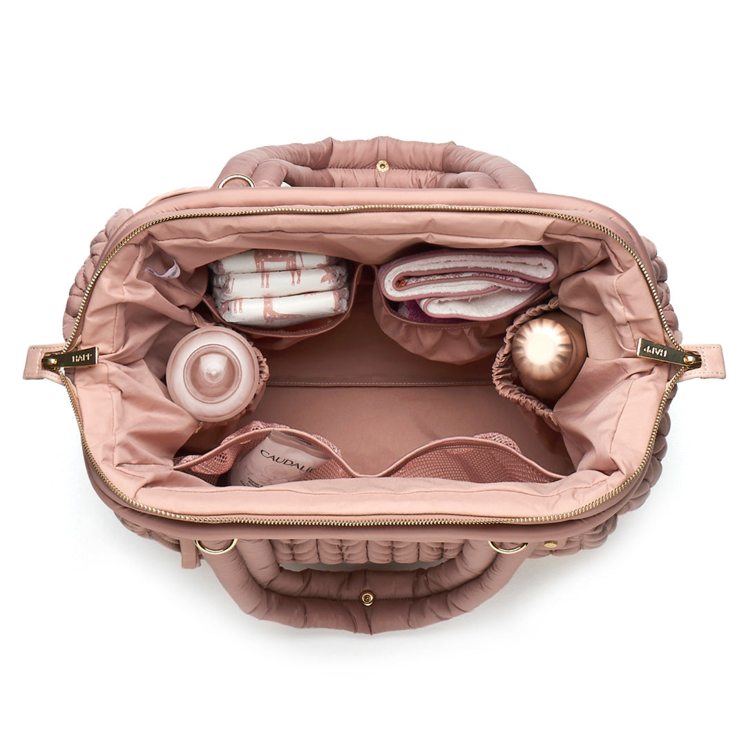 Paige Carryall Rose from above, open and partially packed, showing the wide Mary Poppins opening and the view into every corner of the bag.